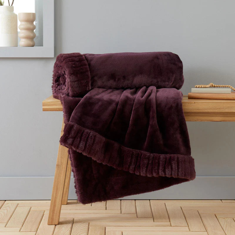 Velvet and Faux Fur Throw in Plum by Catherine Lansfield