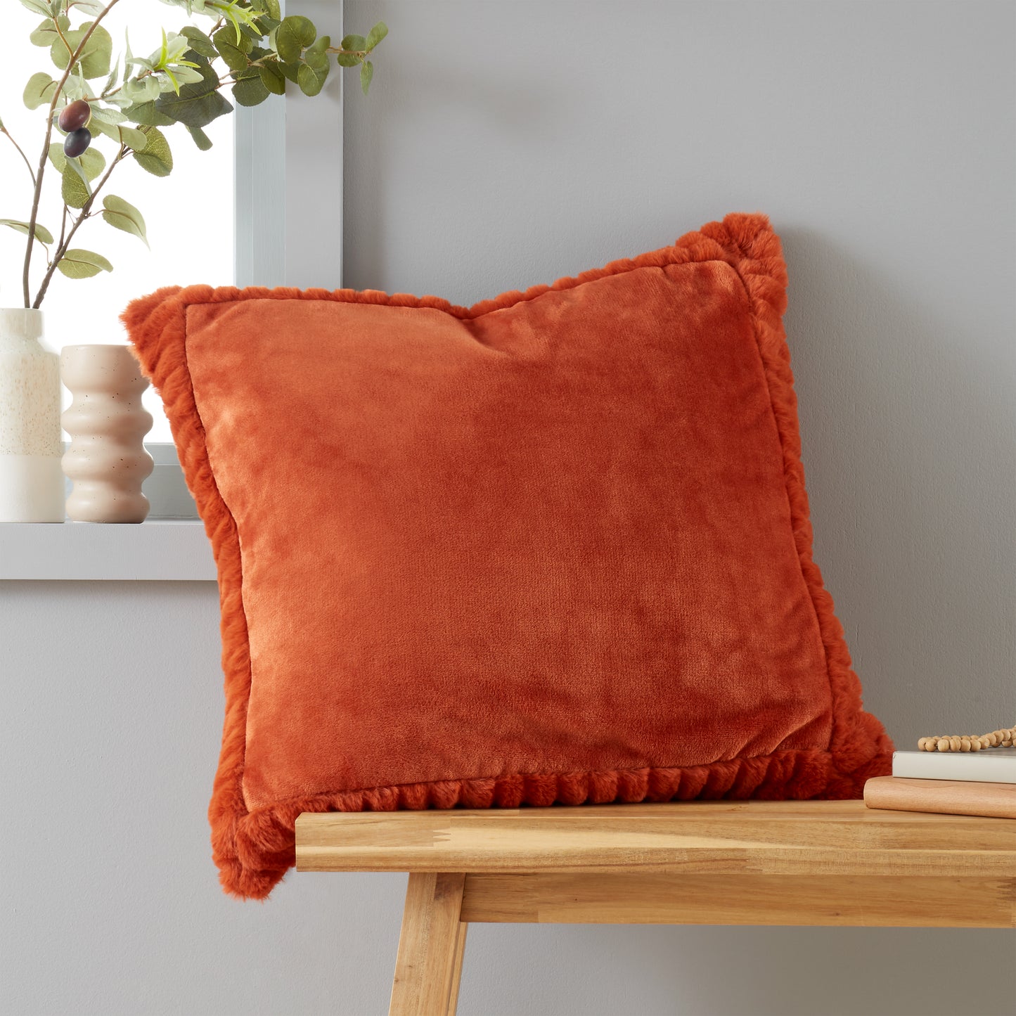 Velvet and Faux Fur Soft Touch Filled Cushion Cushion in Burnt Orange by Catherine Lansfield