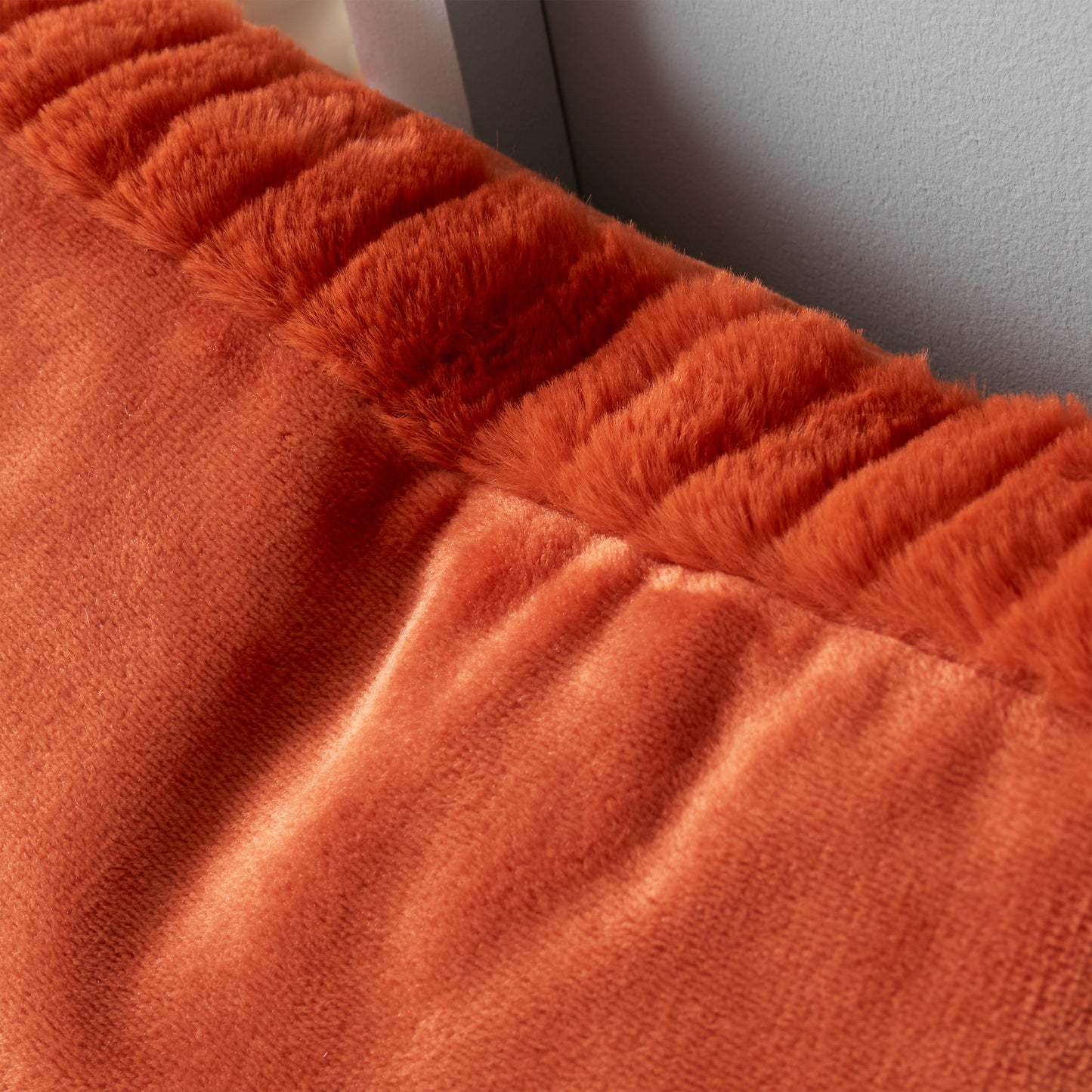 Velvet and Faux Fur Soft Touch Filled Cushion Cushion in Burnt Orange by Catherine Lansfield