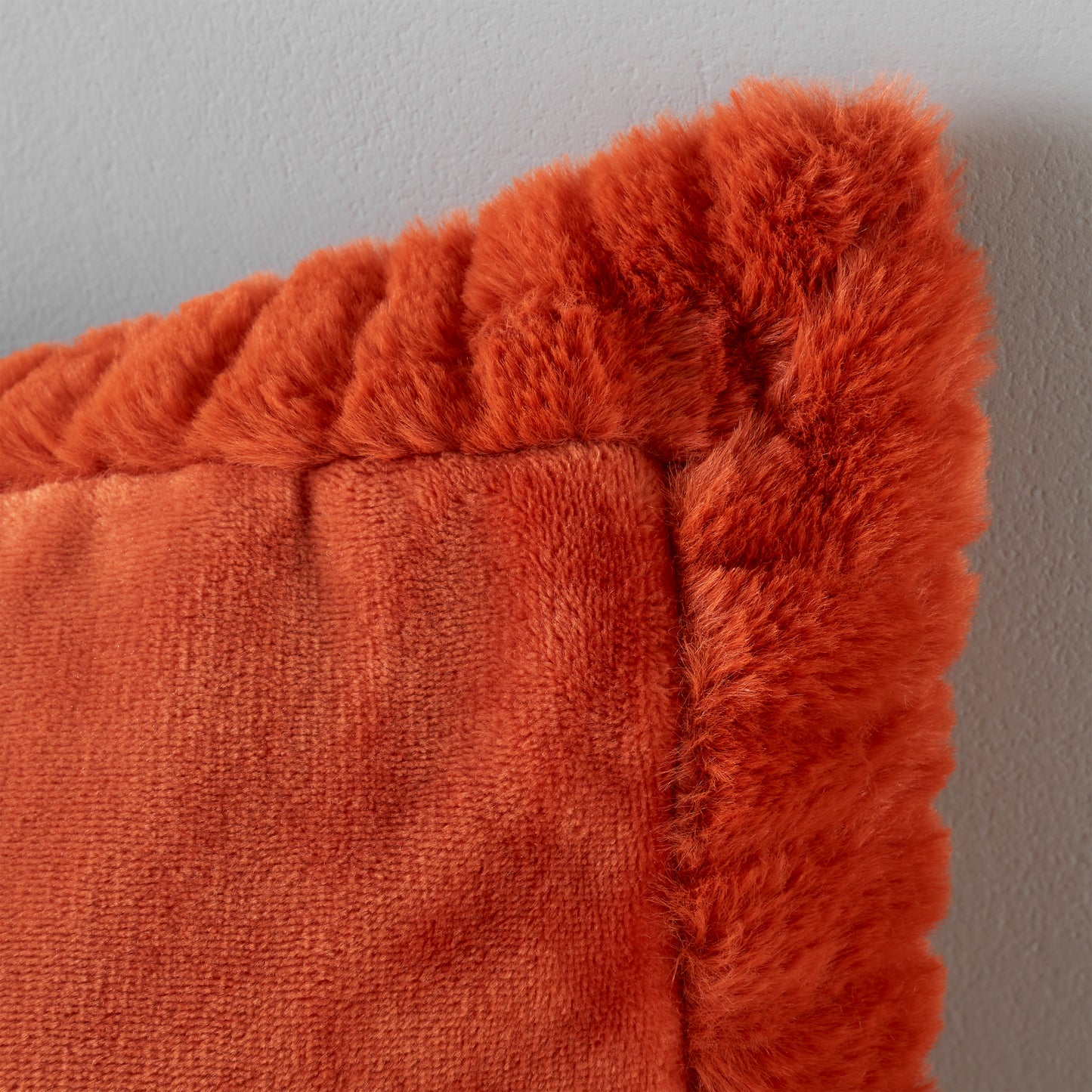 Velvet and Faux Fur Soft Touch Filled Cushion Cushion in Burnt Orange by Catherine Lansfield