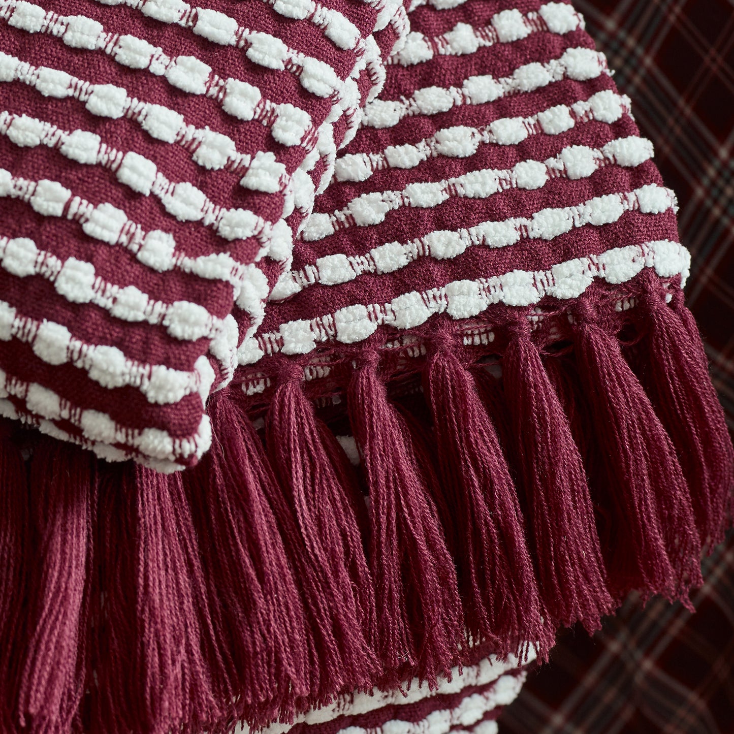 Stab Stitch Blanket Throw in Plum by Catherine Lansfield