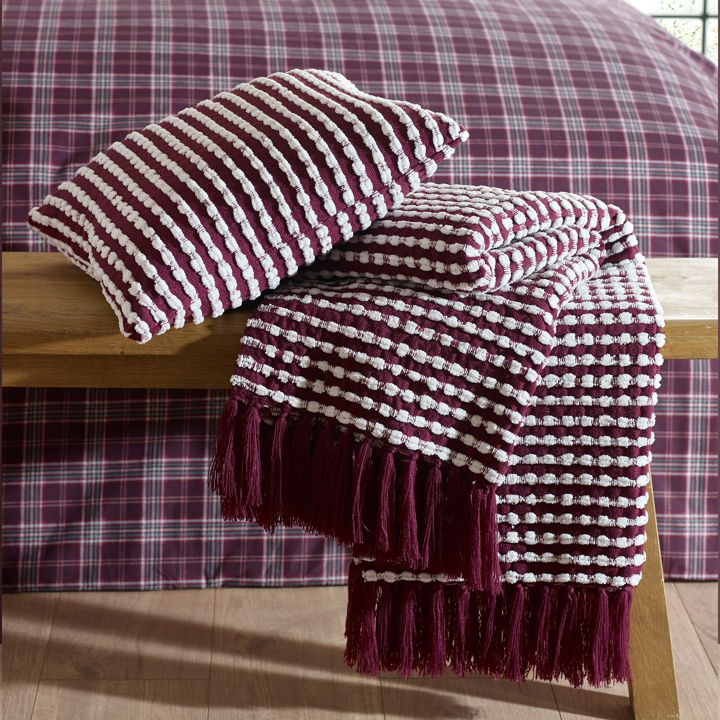 Stab Stitch Blanket Throw in Plum by Catherine Lansfield