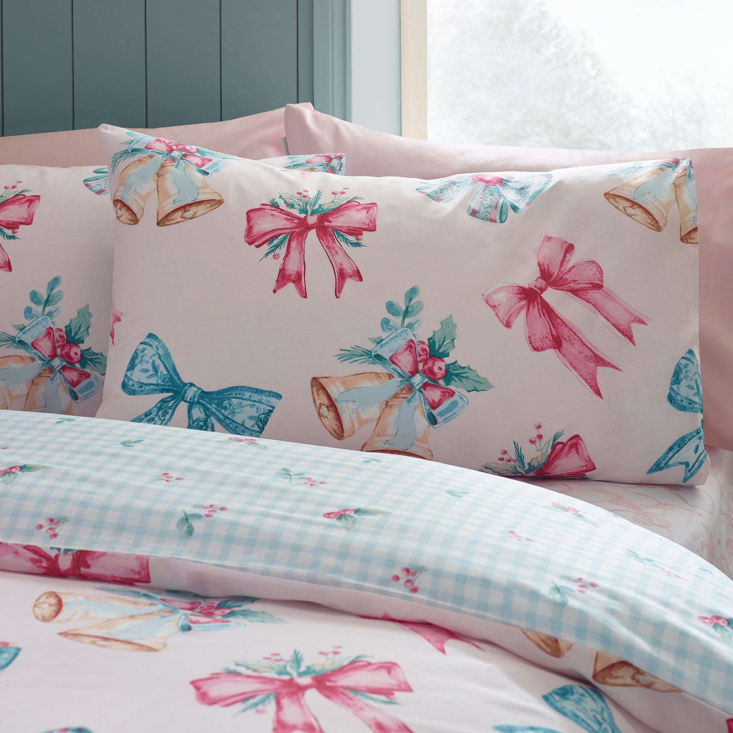 Christmas Bows and Bells Reversible Duvet Cover Set in Pink by Catherine Lansfield