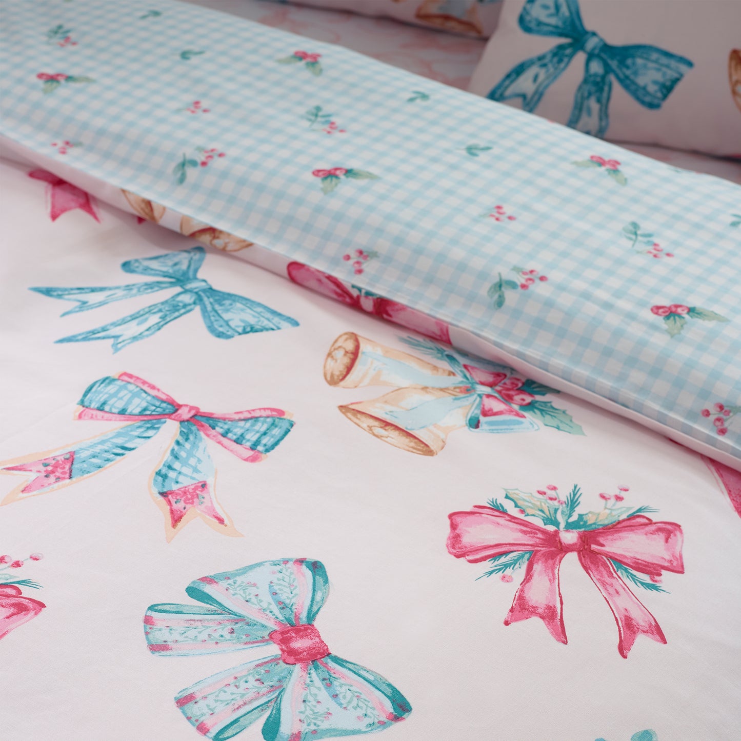 Christmas Bows and Bells Reversible Duvet Cover Set in Pink by Catherine Lansfield