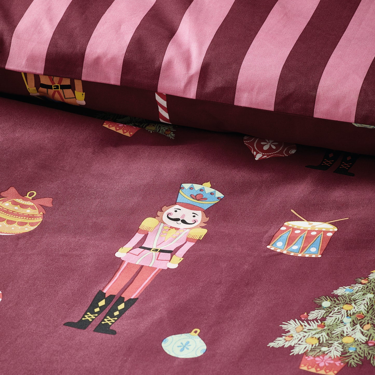 Christmas Nutcracker Stripe Reversible Duvet Cover Set in Plum by Catherine Lansfield