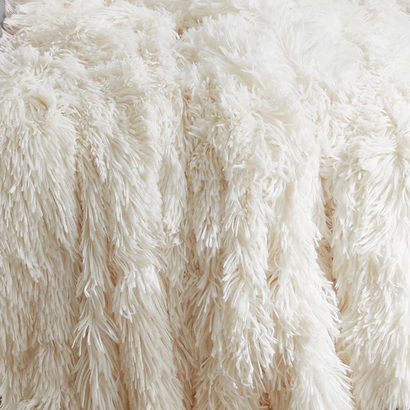 Cuddly Deep Pile Throw in Cream by Catherine Lansfield