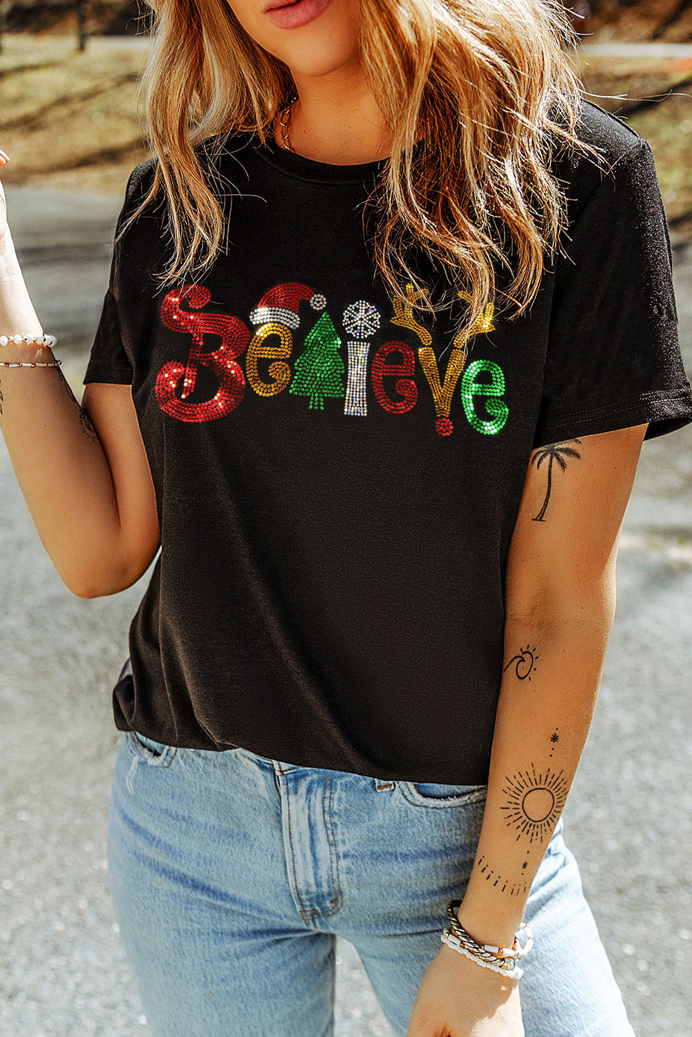 Black BELIEVE Glittered Crewneck Christmas Graphic Tee