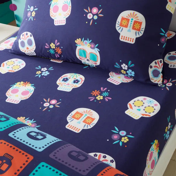 Sugar Skull Fiesta Fitted Sheet in Purple by Catherine Lansfield