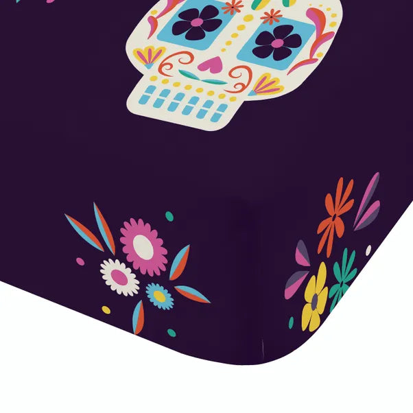 Sugar Skull Fiesta Fitted Sheet in Purple by Catherine Lansfield