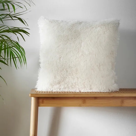 Cuddly Deep Pile Faux Fur Cushion in Cream by Catherine Lansfield