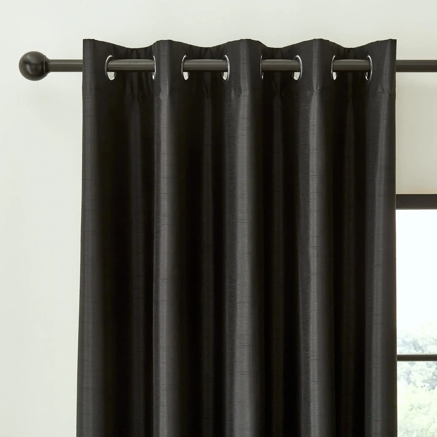 Black Faux Silk Blackout Eyelet Curtains - Catherine Lansfield