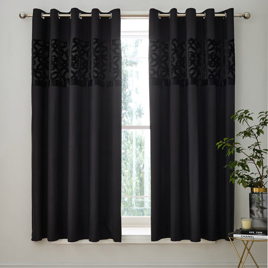 Lattice Cut Velvet Lined Eyelet Curtains in Black by Catherine Lansfield