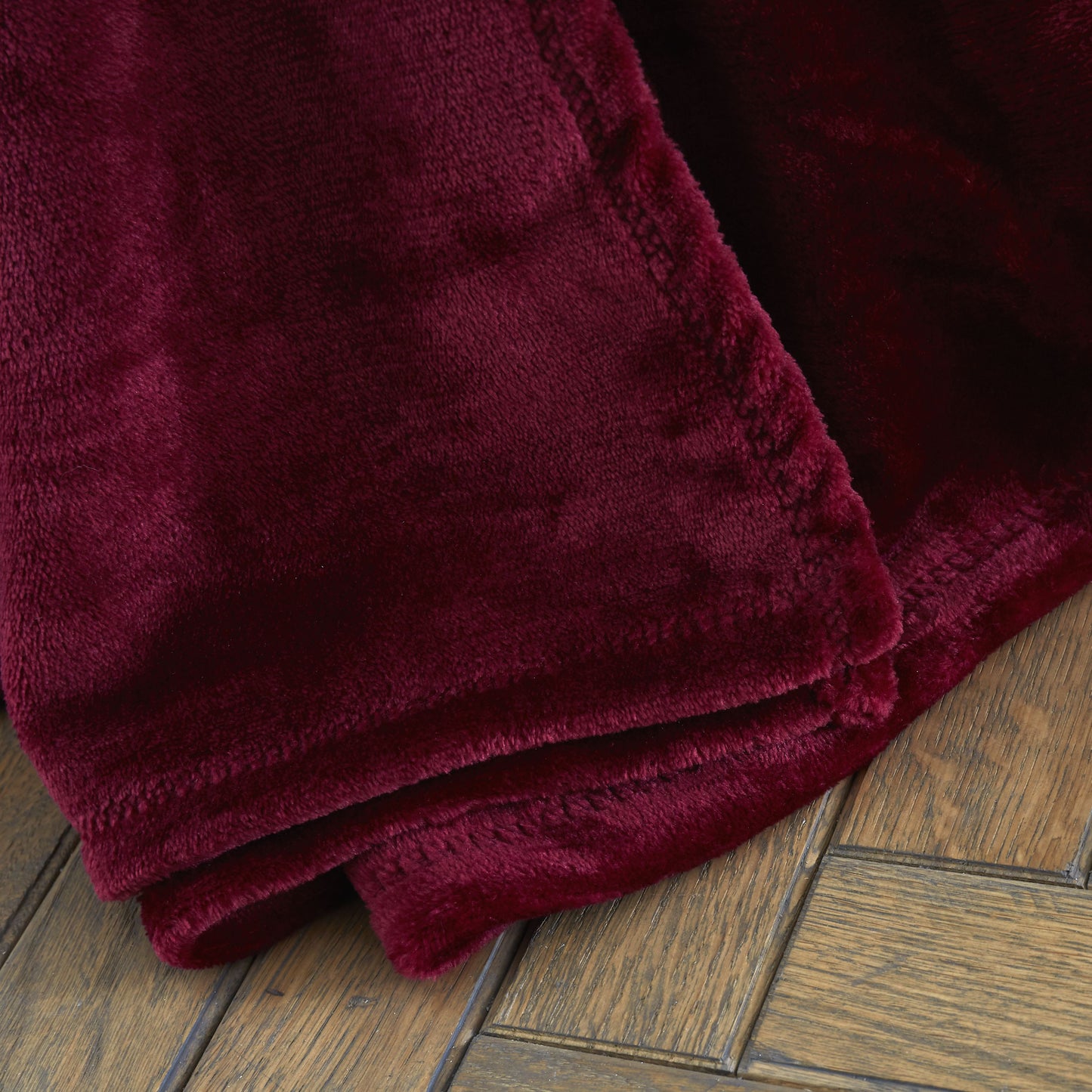 Velvet Touch Raschel Blanket Throw in Red by Catherine Lansfield