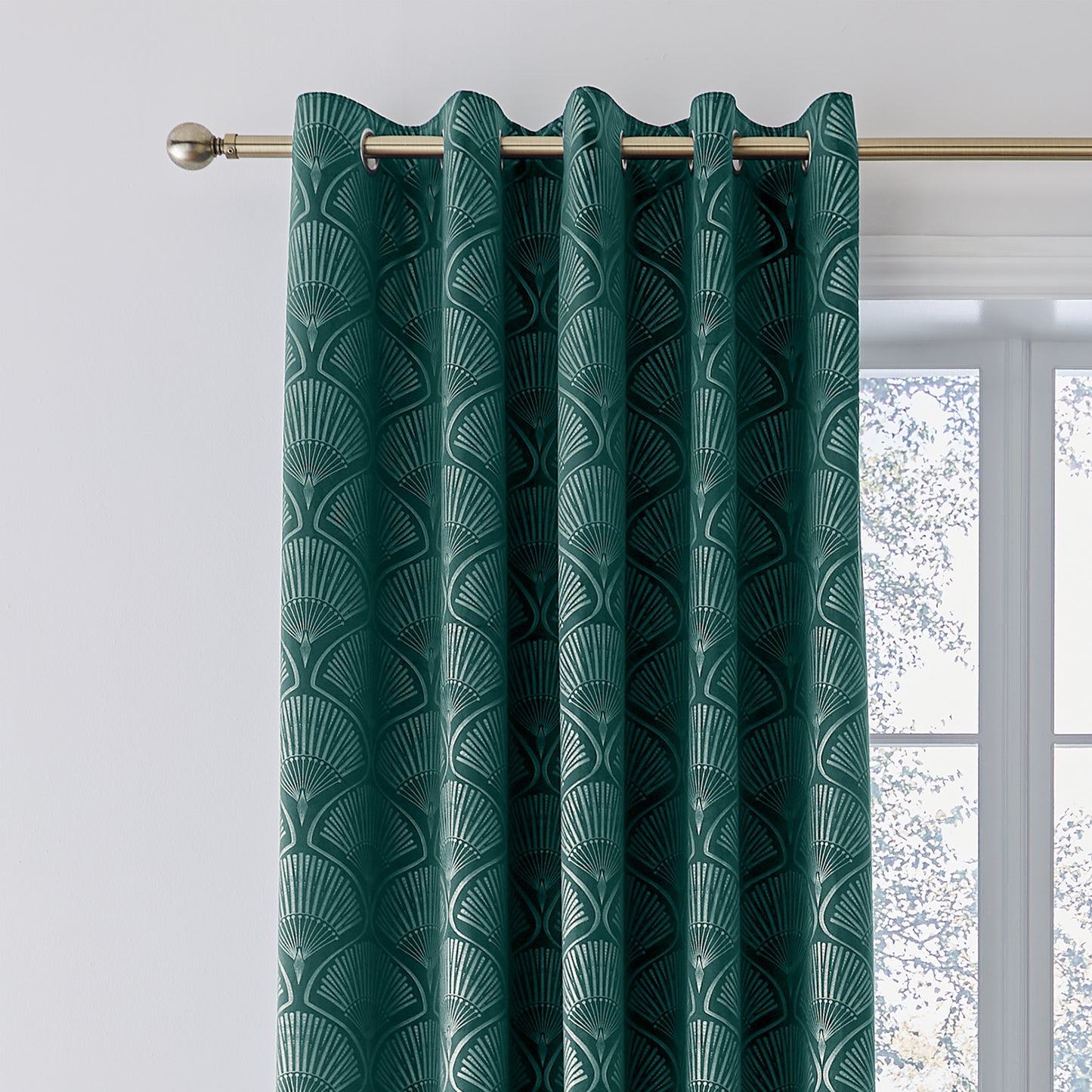 Art Deco Pearl Lined Eyelet Curtains in Teal by Catherine Lansfield