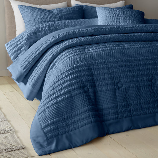 Lennon Stripe Seersucker Quilted Bedspread in Lansfield Blue by Catherine Lansfield