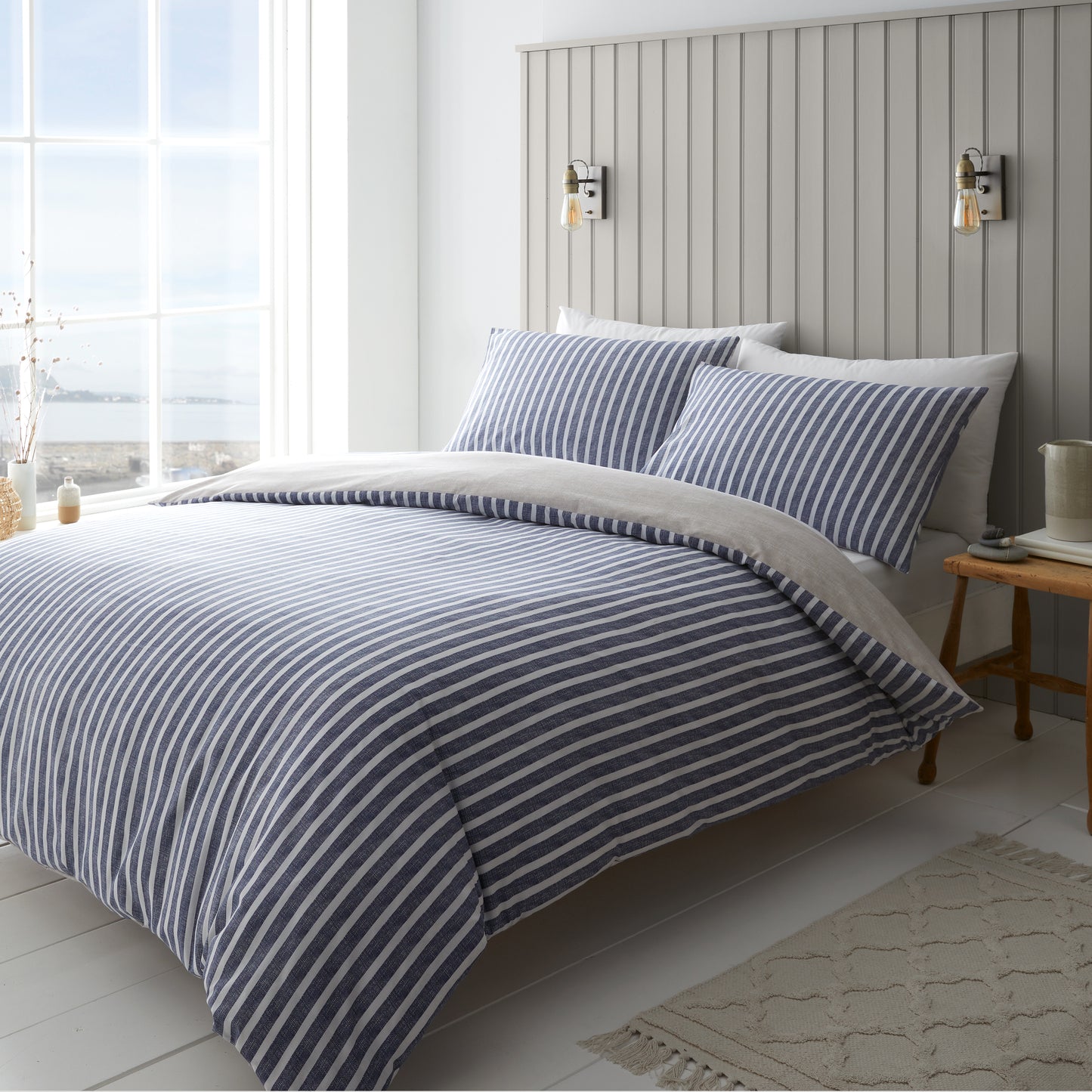 Textured Banded Stripe Reversible Duvet Cover Set in Blue by Catherine Lansfield