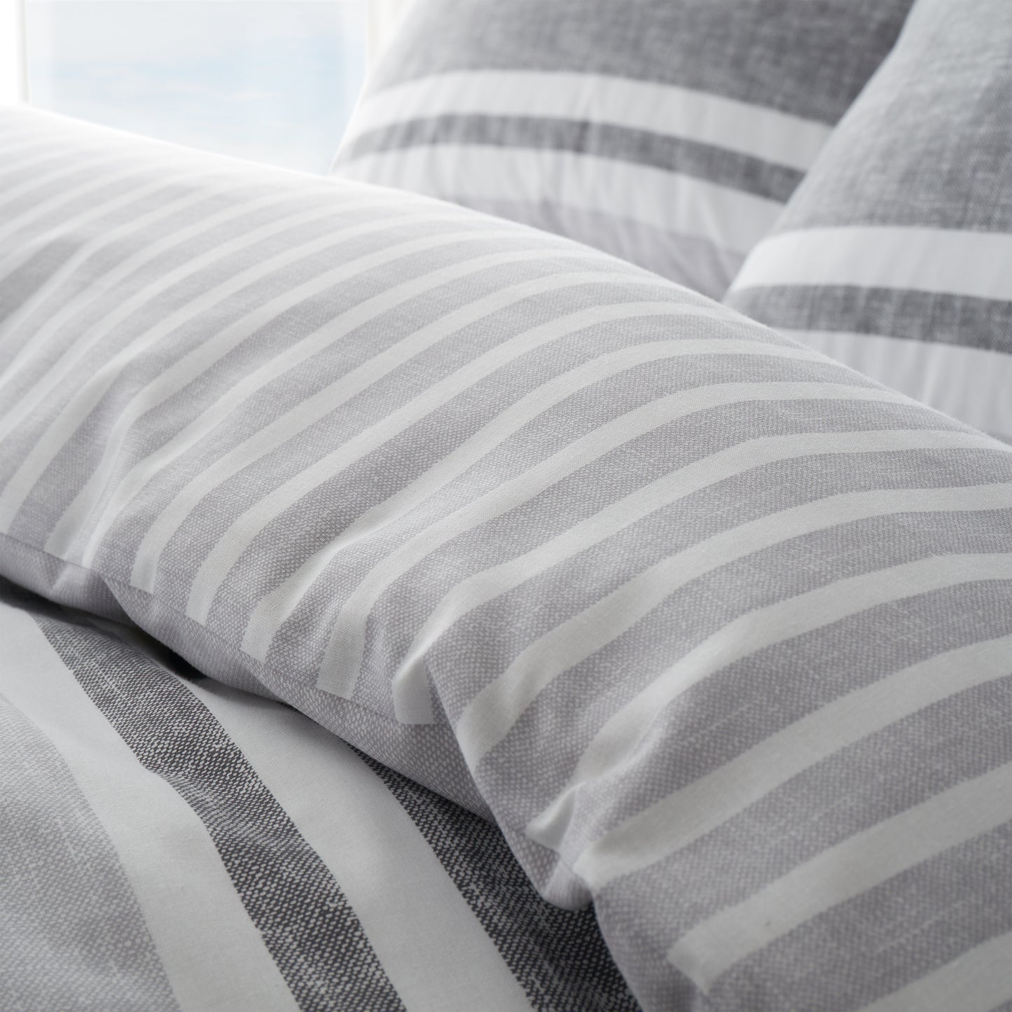 Textured Banded Stripe Reversible Duvet Cover Set in Charcoal by Catherine Lansfield