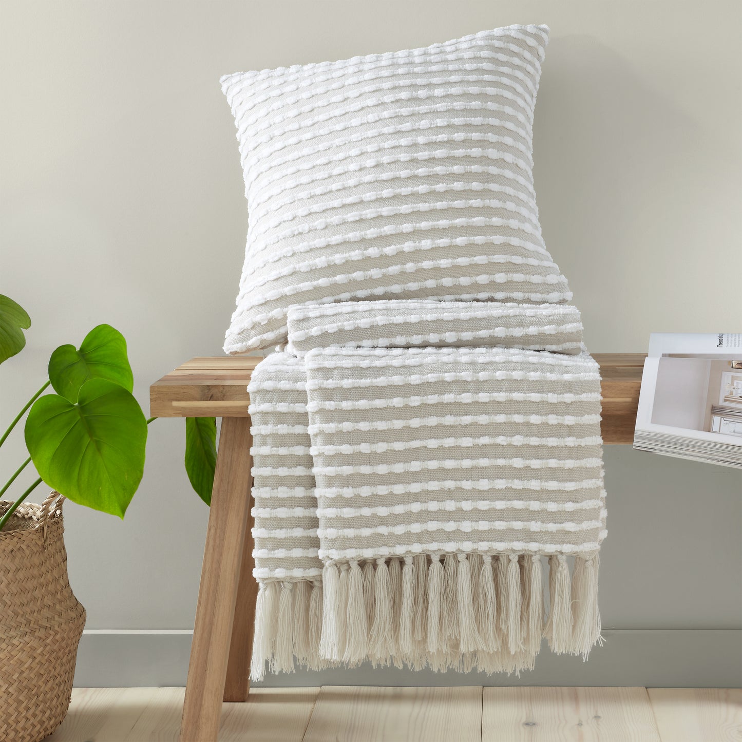 Stab Stitch Filled Cushion in Natural by Catherine Lansfield