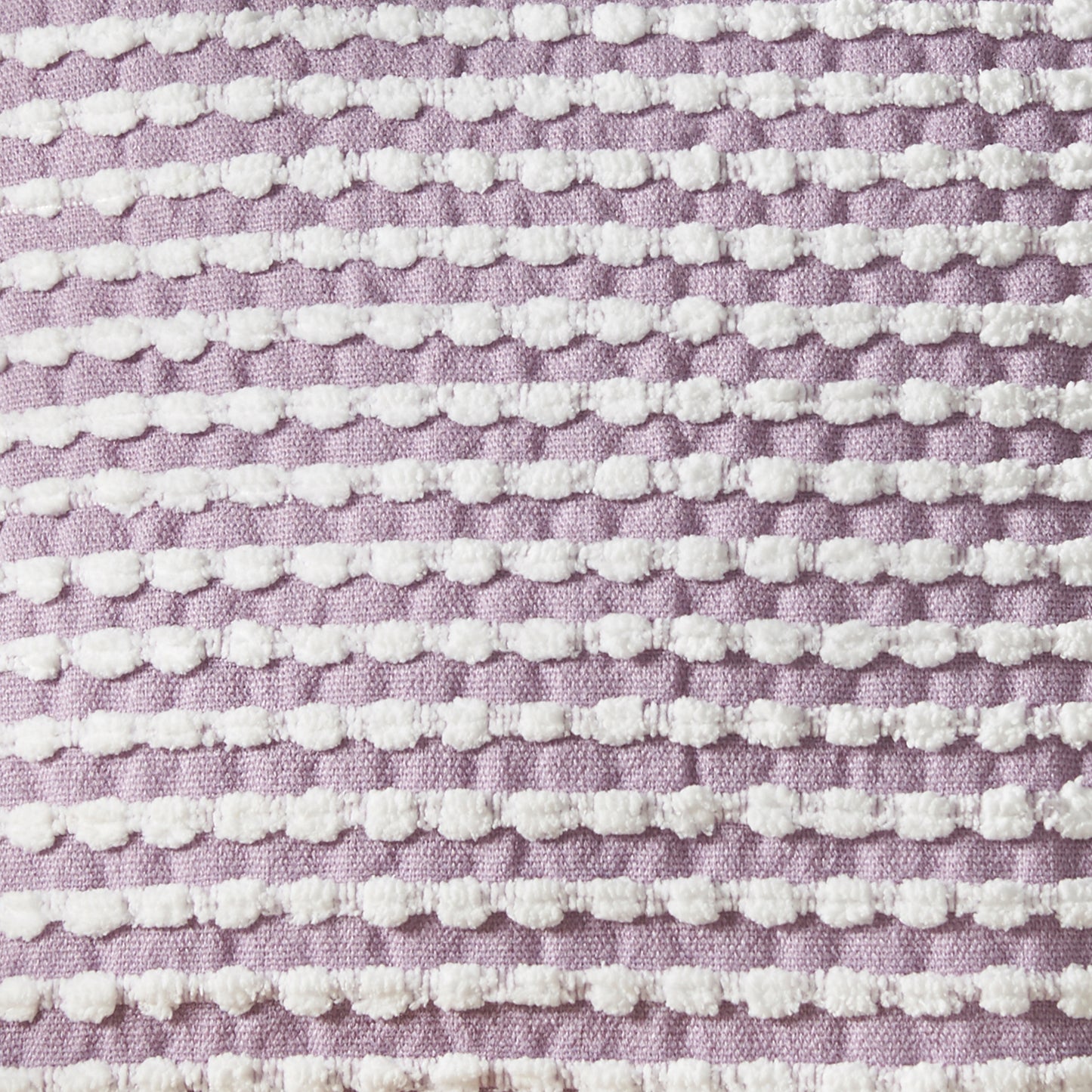 Stab Stitch Fileld Cushion in Lilac by Catherine Lansfield