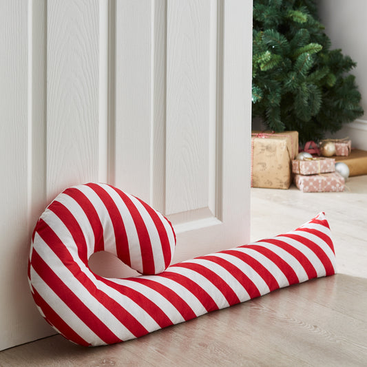 Candy Cane Shaped Door Draught Excluder in White / Red by Catherine Lansfield