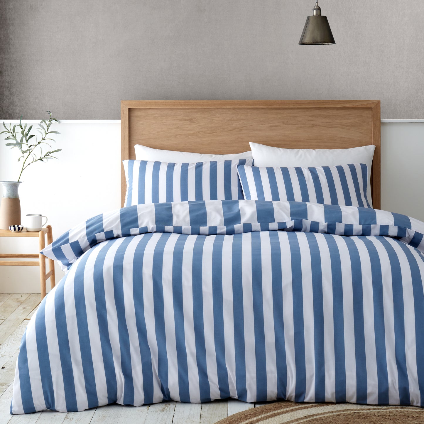 Cove Stripe Reversible Cover Set in Blue by Catherine Lansfield