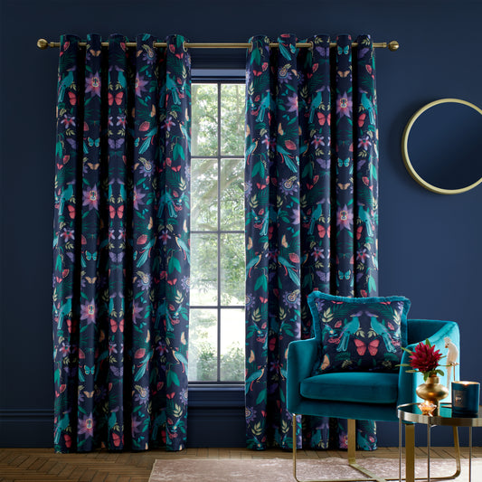 Mya Tropical Floral Lined Eyelet Curtains in Navy Blue by Catherine Lansfield