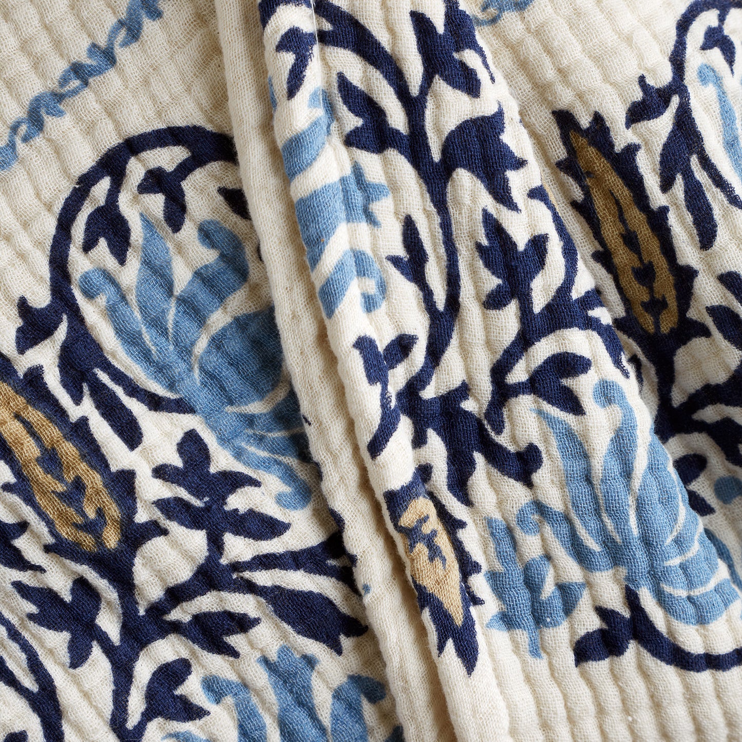 Ines Matelasse Throw by Pineapple Elephant in Blue and Ochre