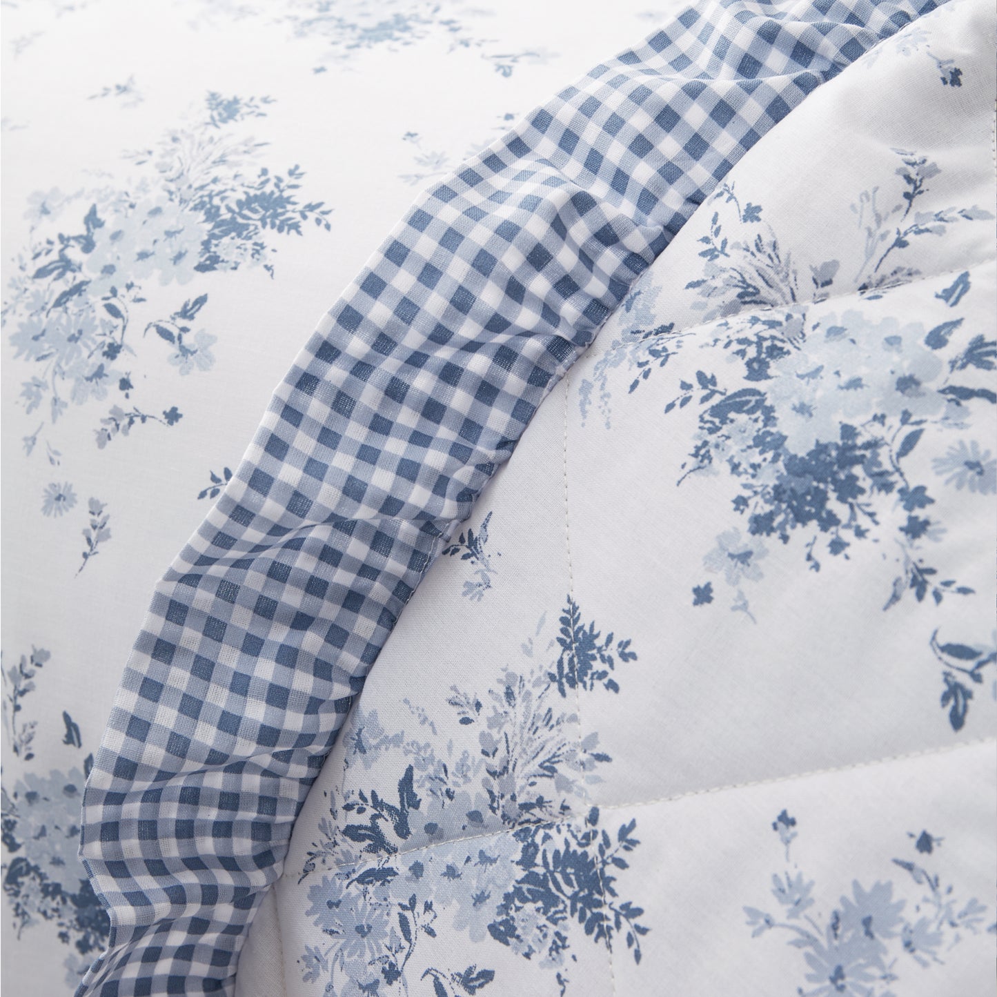 Lucie Floral Frill Fully Reversible Bedspread in White Blue by Catherine Lansfield