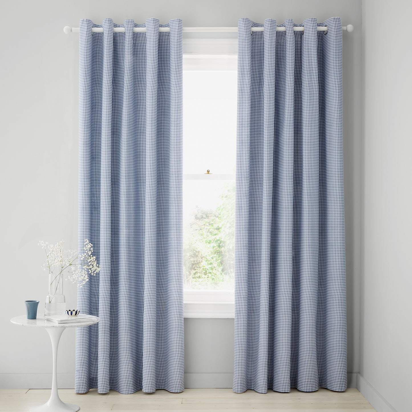 Lucie Floral Frill Fully Reversible 66x90 Inch Eyelet Curtains in Blue by Catherine Lansfield