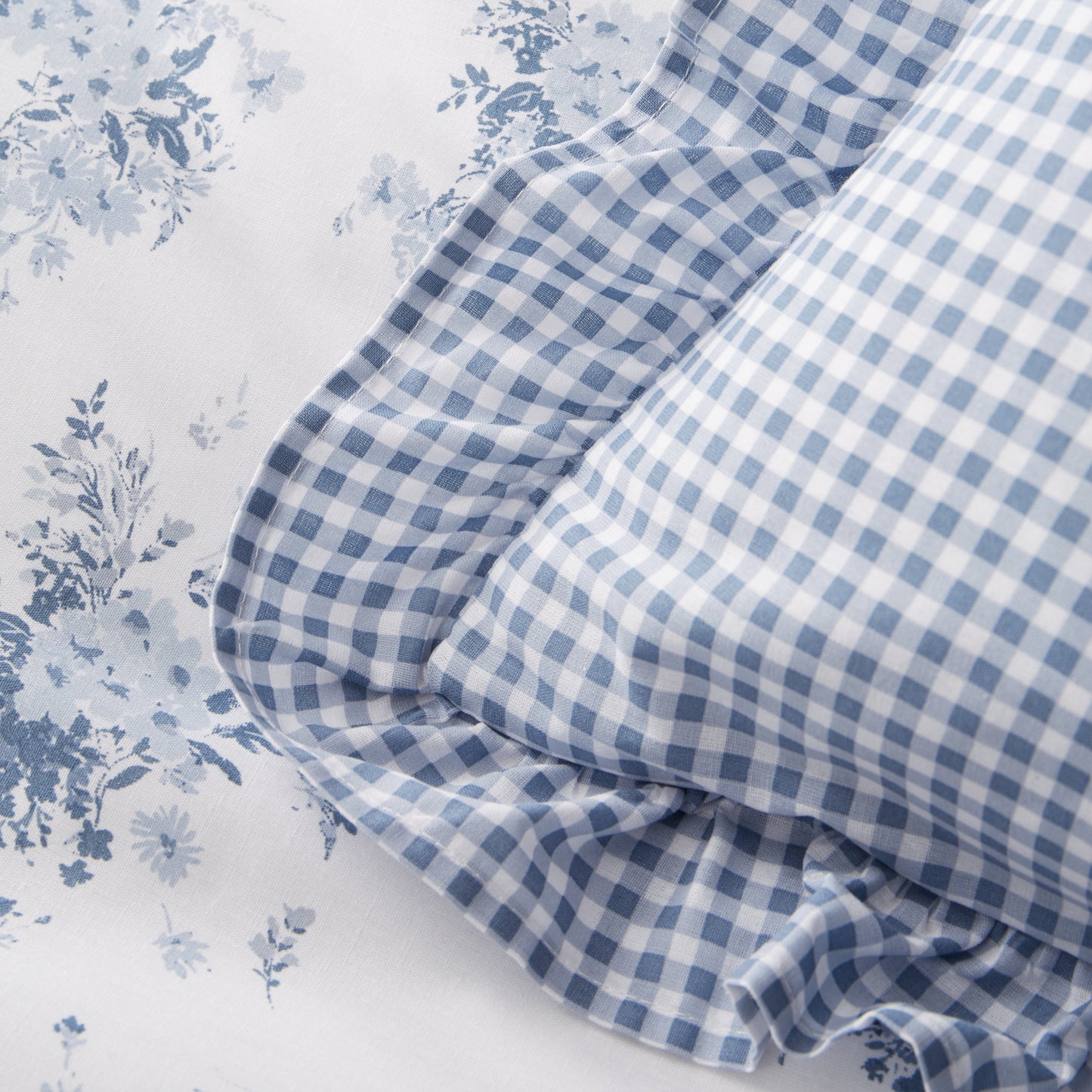 Lucie Floral Frill Fully Reversible Filled Cushion in White Blue by Catherine Lansfield