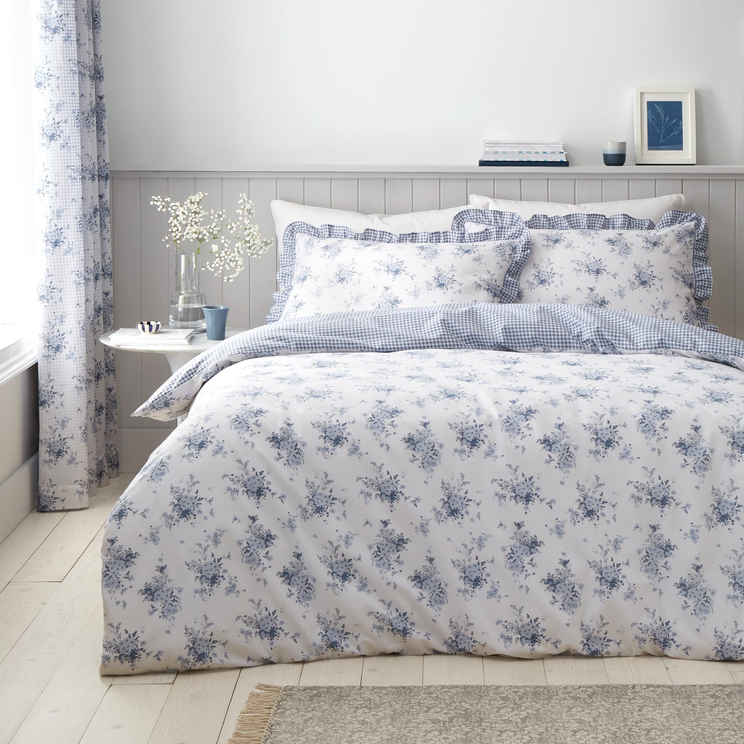 Lucie Floral Frill Reversible Duvet Cover Set in White Blue by Catherine Lansfield