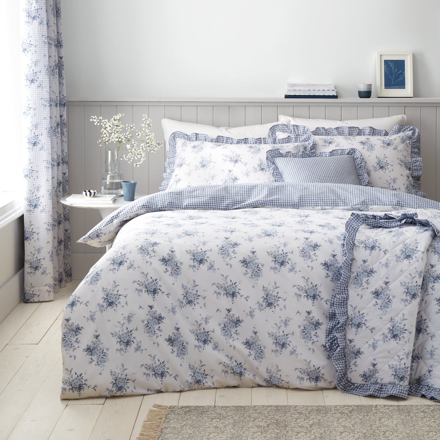 Lucie Floral Frill Reversible Duvet Cover Set in White Blue by Catherine Lansfield