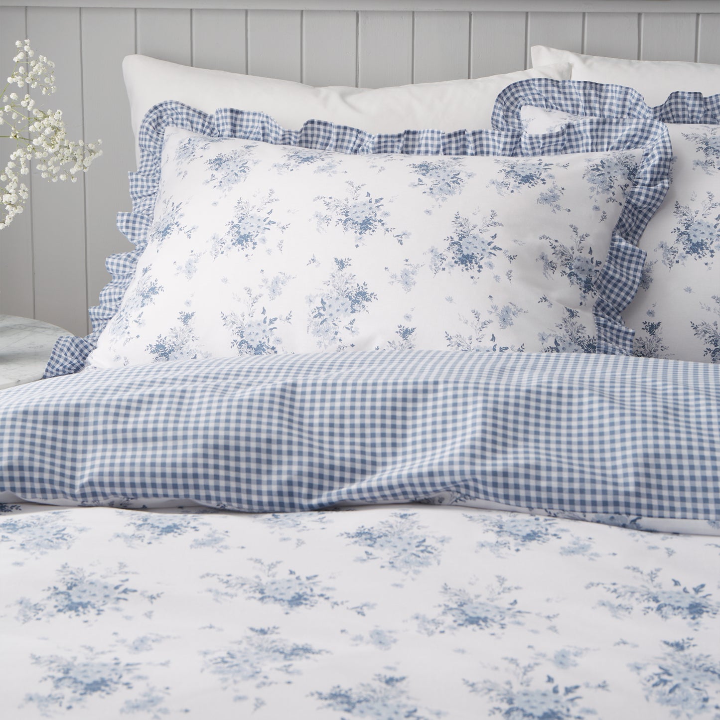 Lucie Floral Frill Reversible Duvet Cover Set in White Blue by Catherine Lansfield