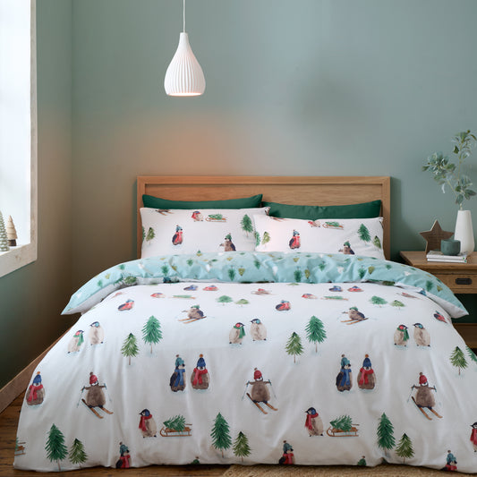 Brushed Snowy Penguin Cotton Reversible Duvet Cover Set in White by Catherine Lansfield