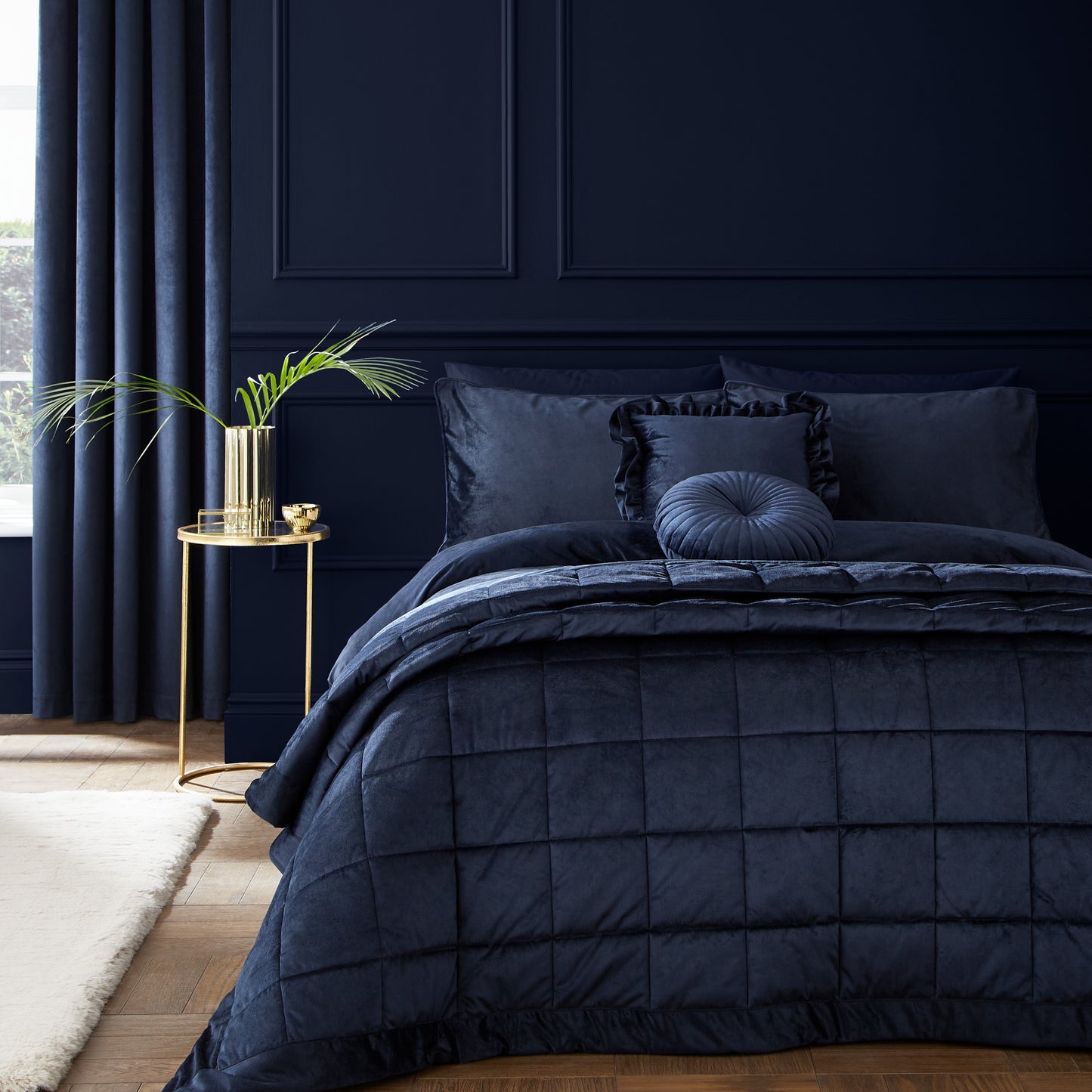 Kingsley Matt Velvet Quilted Bedspread in Navy by Catherine Lansfield