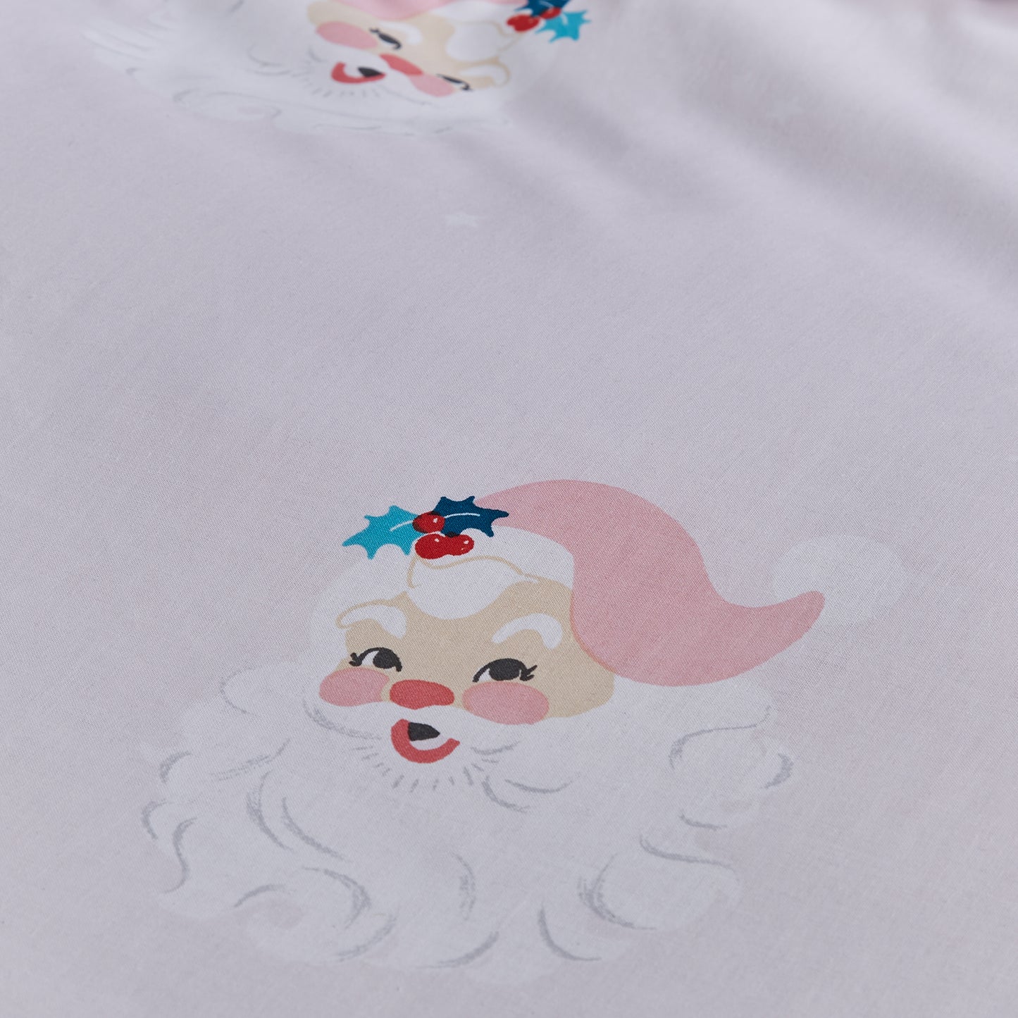 Vintage Christmas Santa Reversible Duvet Cover Set in Pink by Catherine Lansfield