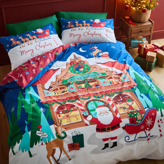 Christmas Santa's Workshop Reversible Duvet Cover Set in Navy Blue by Catherine Lansfield