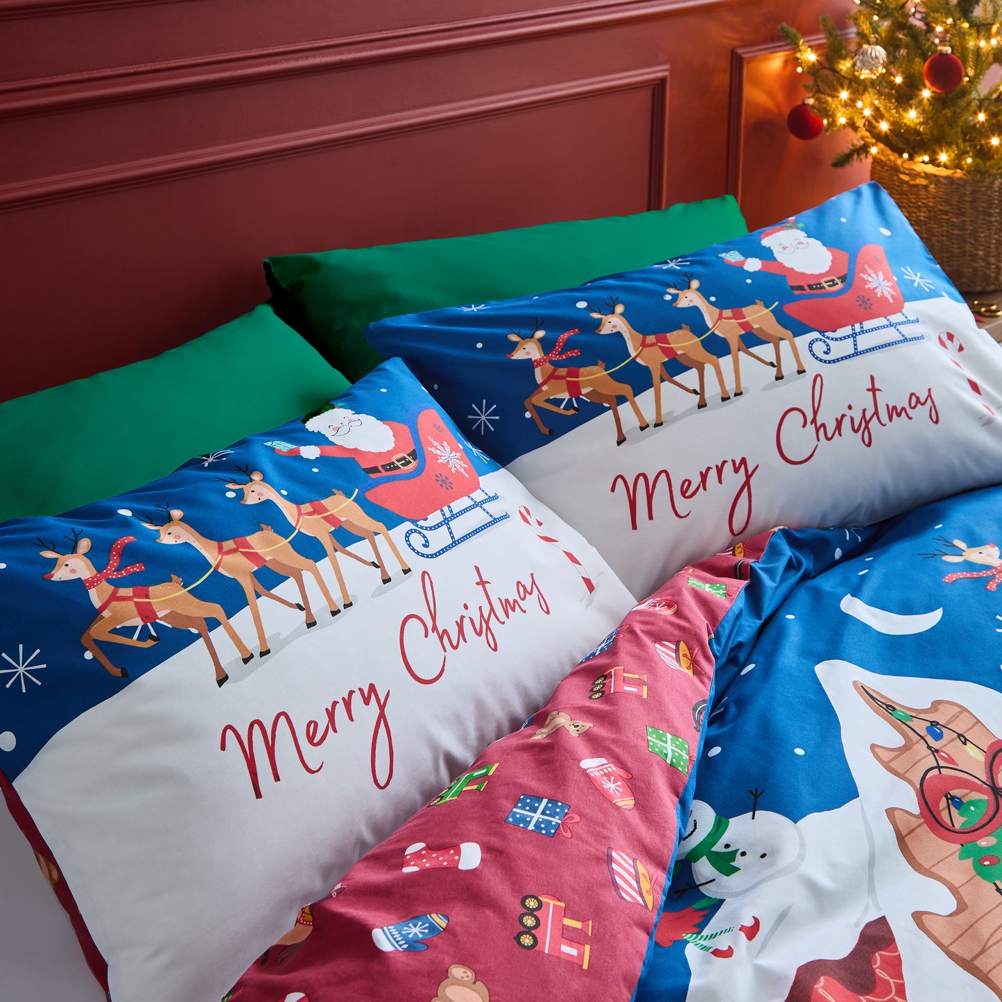 Christmas Santa's Workshop Reversible Duvet Cover Set in Navy Blue by Catherine Lansfield