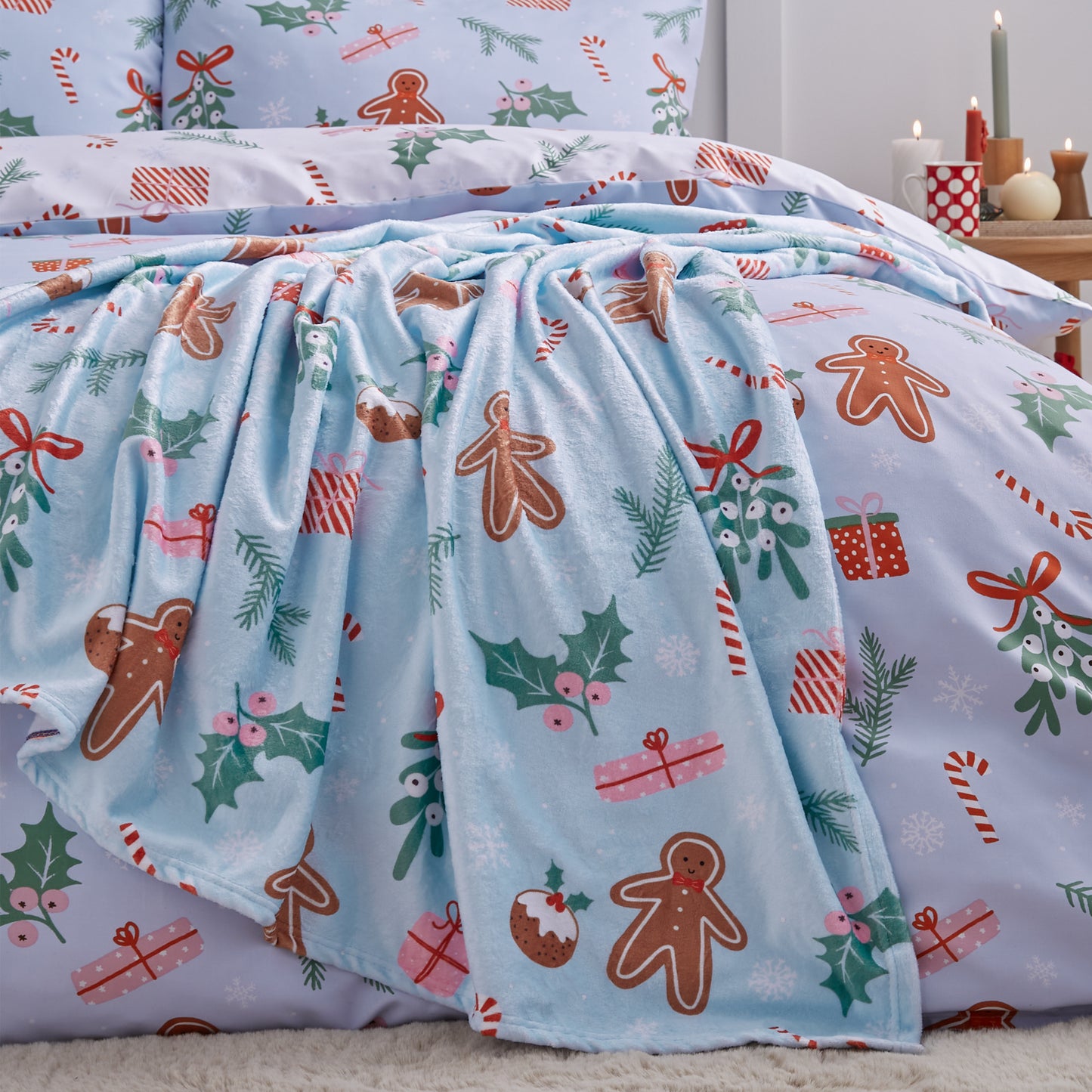 Christmas Gingerbread Cosy Fleece Blanket Throw in Blue by Catherine Lansfield