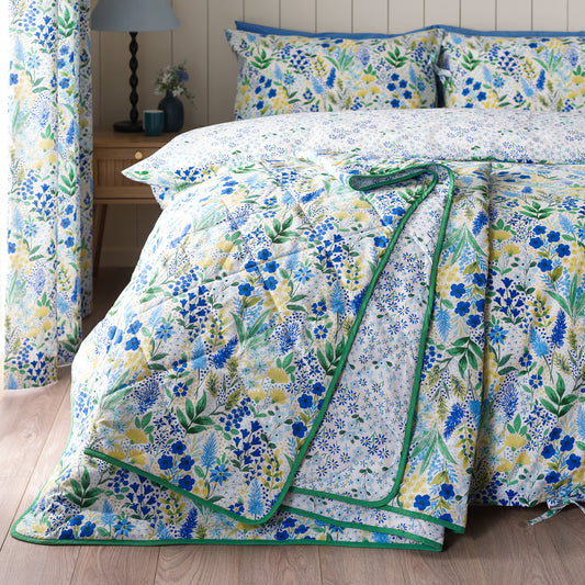 Tilly Floral Fully Reversible Bedspread in Blue by Catherine Lansfield