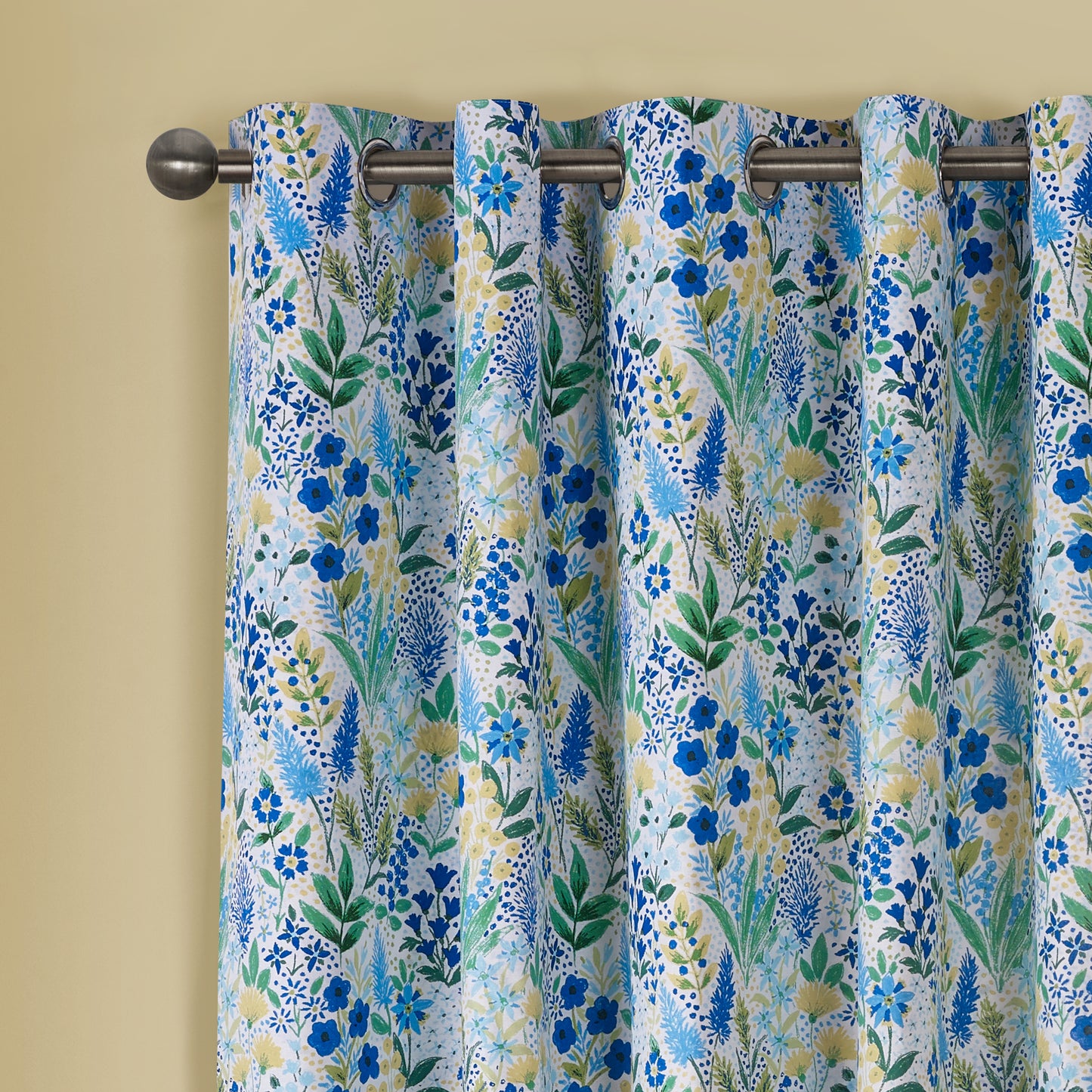 Tilly Floral Fully Reversible 66x90 Inch Eyelet Curtains in Blue by Catherine Lansfield