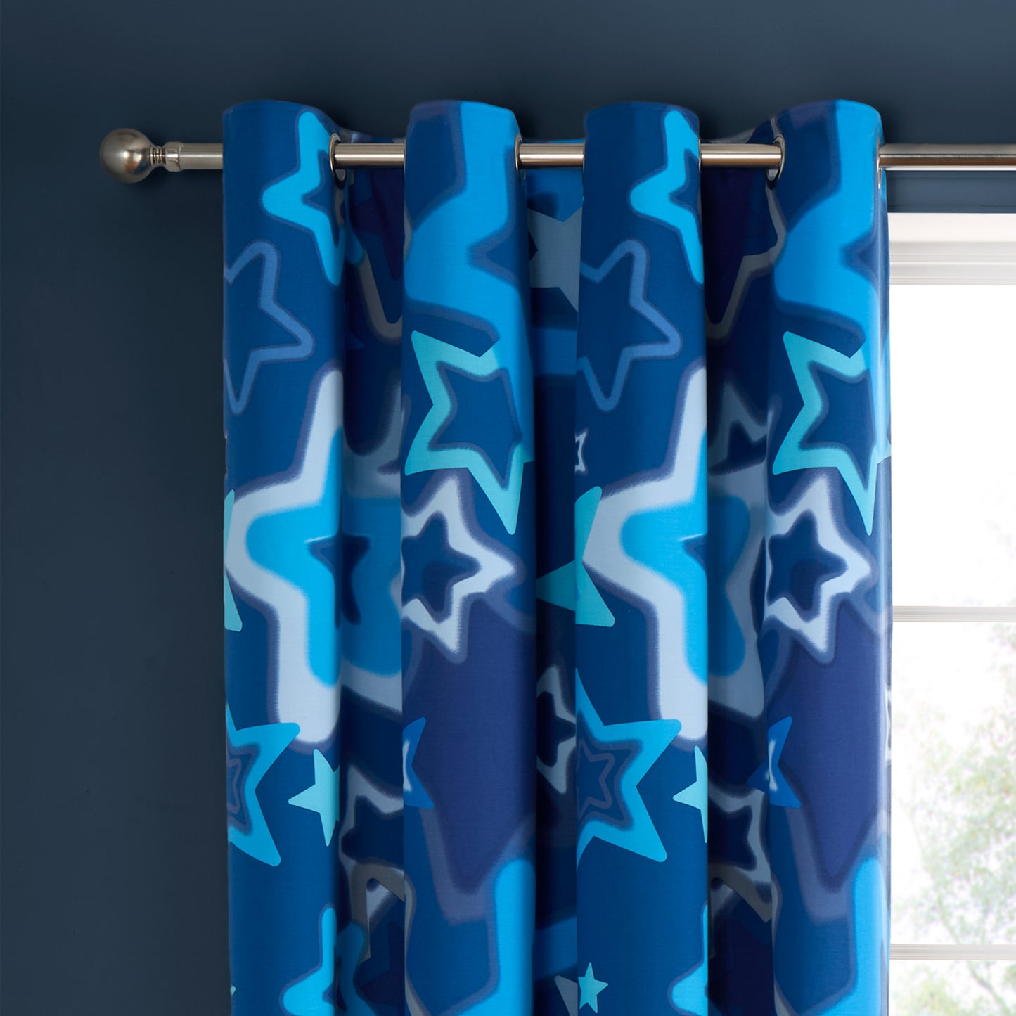 Ombre Stars Fully Reversible Eyelet Curtains in Blue by Catherine Lansfield