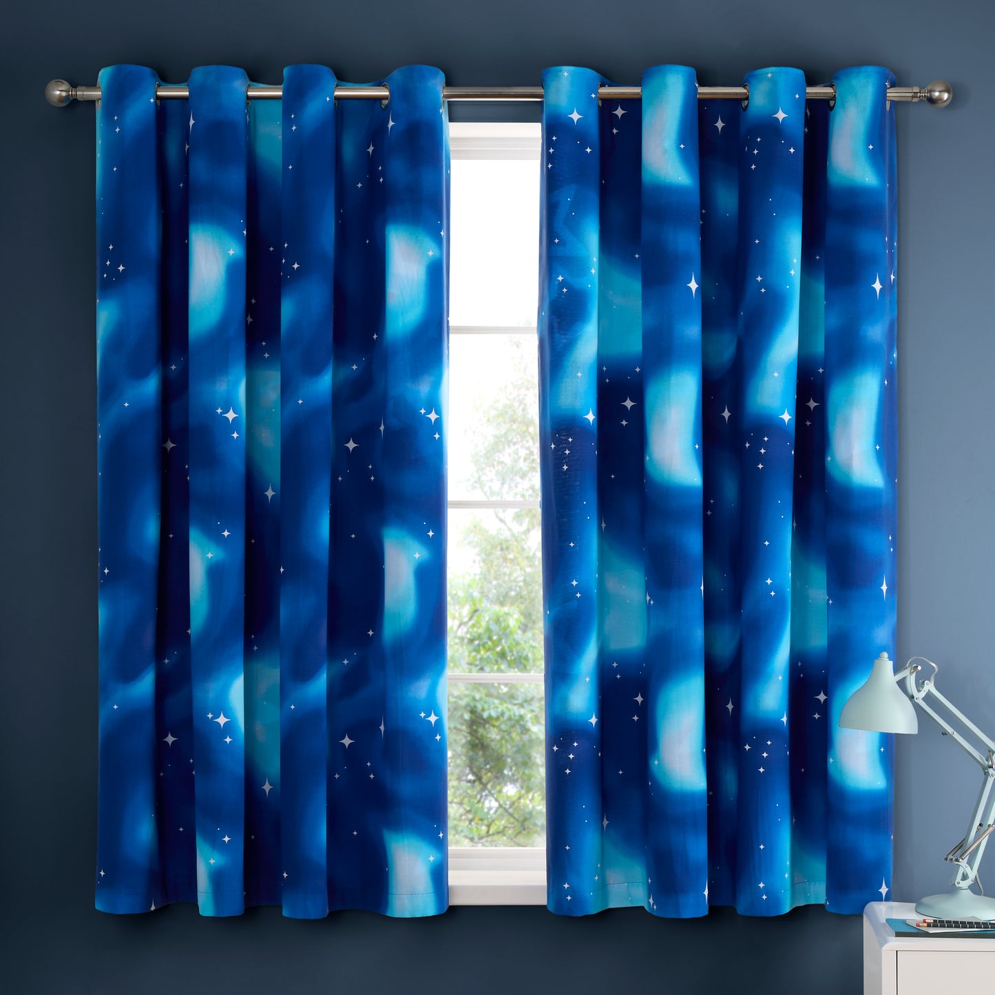 Ombre Stars Fully Reversible Eyelet Curtains in Blue by Catherine Lansfield