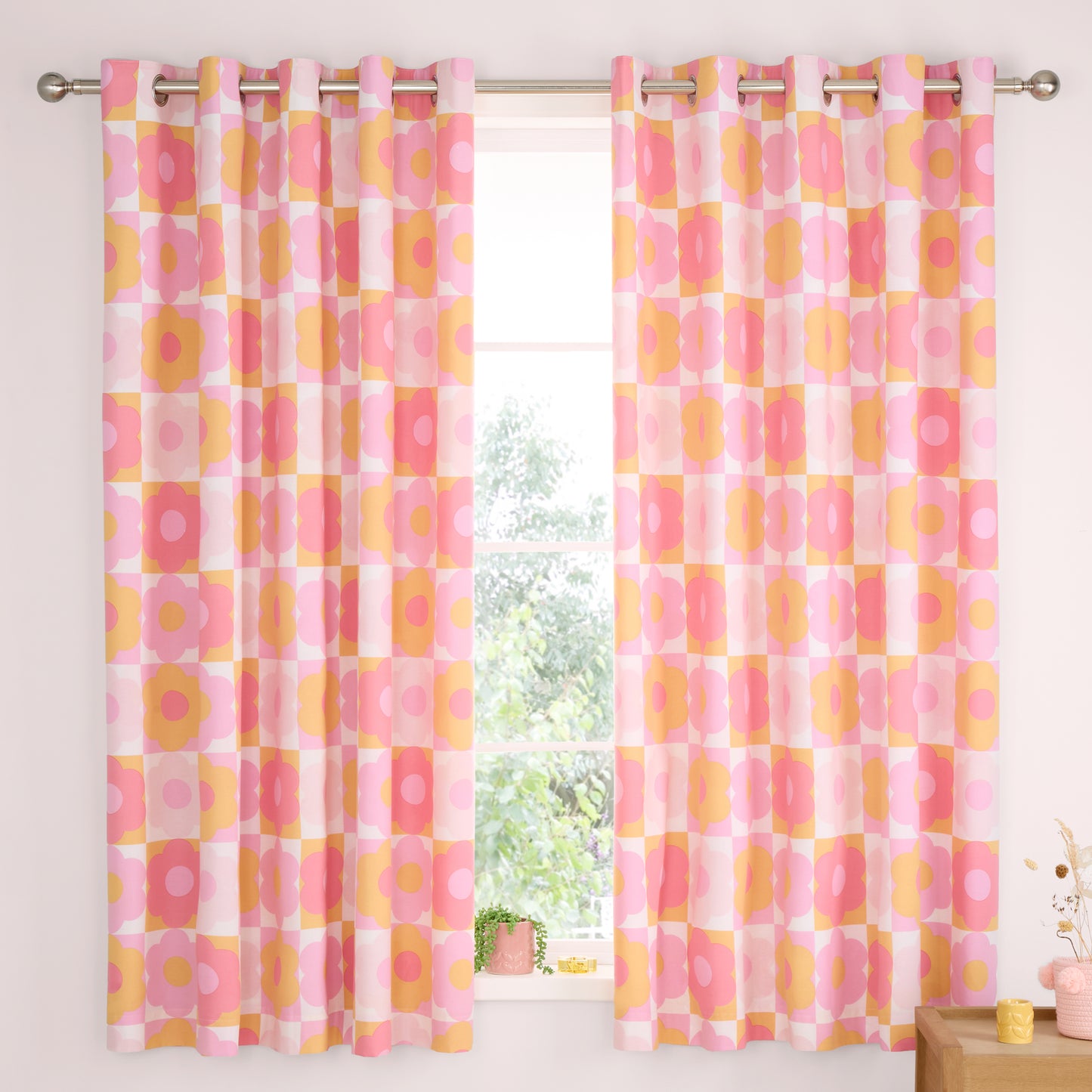 Retro Daisy 66x72 Inch Fully Reversible Eyelet Curtains in Pink by Catherine Lansfield