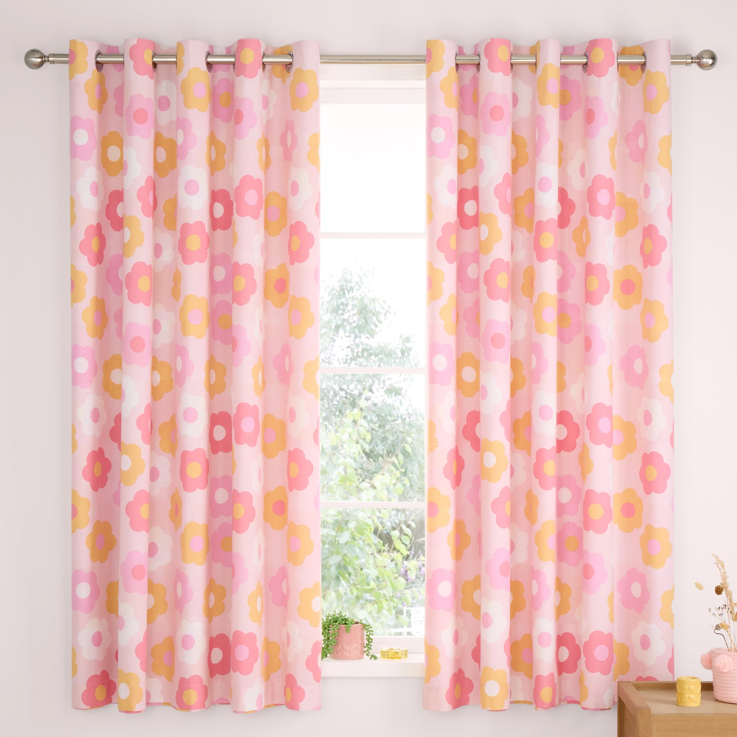 Retro Daisy 66x72 Inch Fully Reversible Eyelet Curtains in Pink by Catherine Lansfield