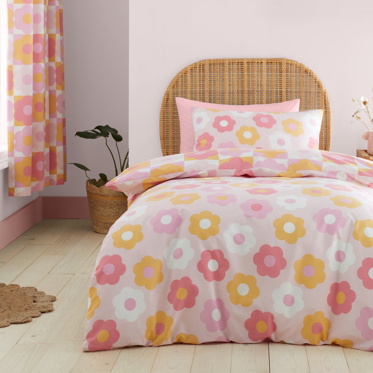 Retro Daisy Reversible Duvet Cover Set in Pink by Catherine Lansfield