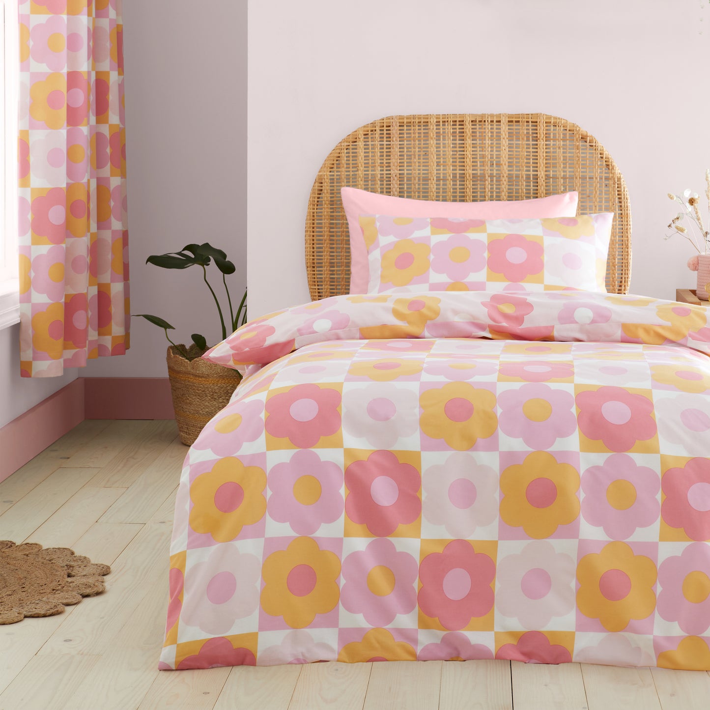 Retro Daisy Reversible Duvet Cover Set in Pink by Catherine Lansfield