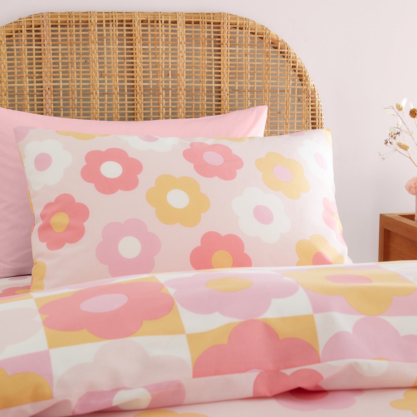 Retro Daisy Reversible Duvet Cover Set in Pink by Catherine Lansfield