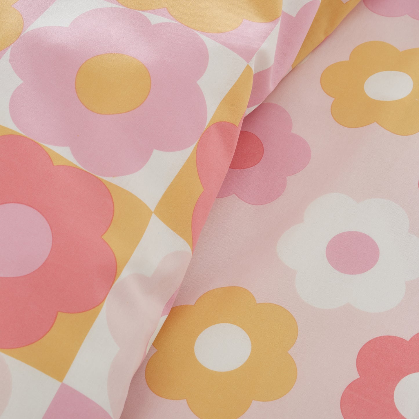 Retro Daisy Reversible Duvet Cover Set in Pink by Catherine Lansfield