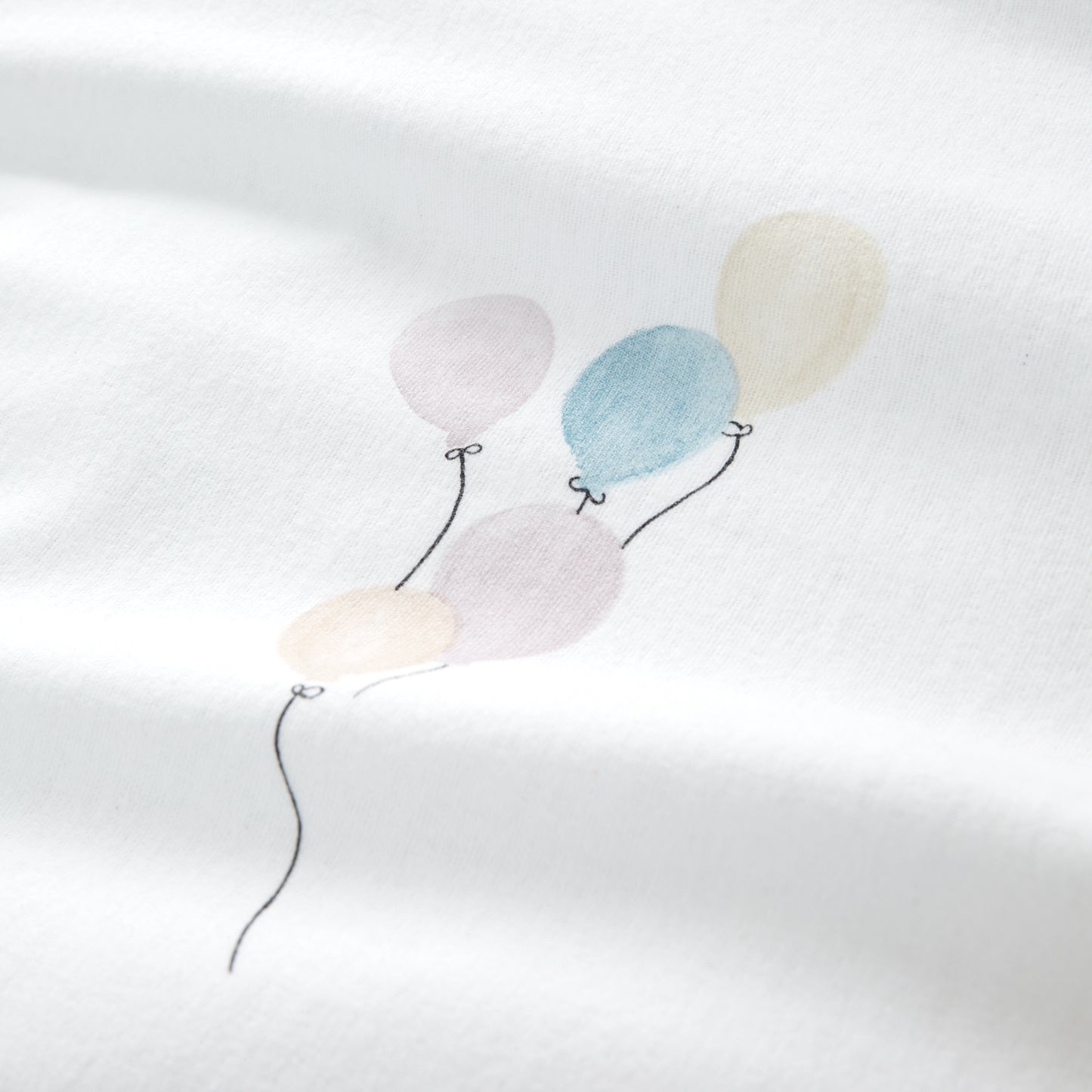 Brushed Balloons Reversible Cotton Duvet Cover Set in White by Bianca Kids